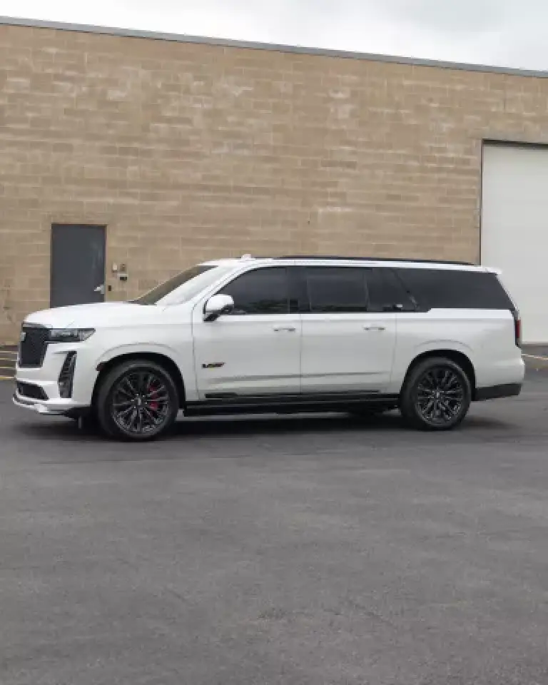 white 2022 Cadillac Escalade-V full size luxury SUV front angle