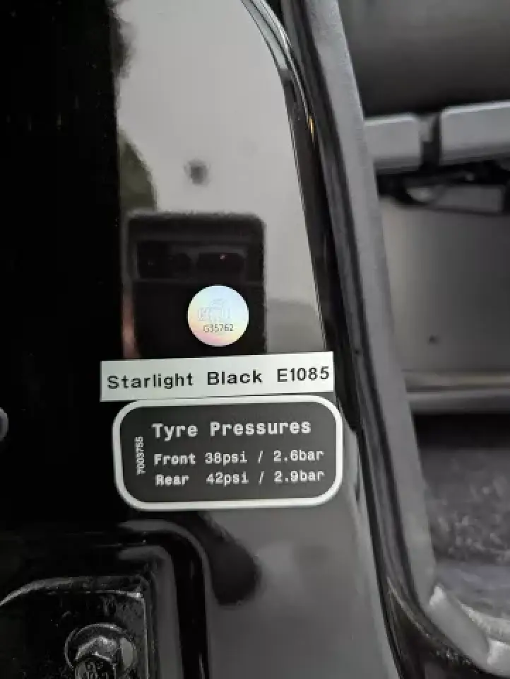 London taxi paint code and tire pressure label detail