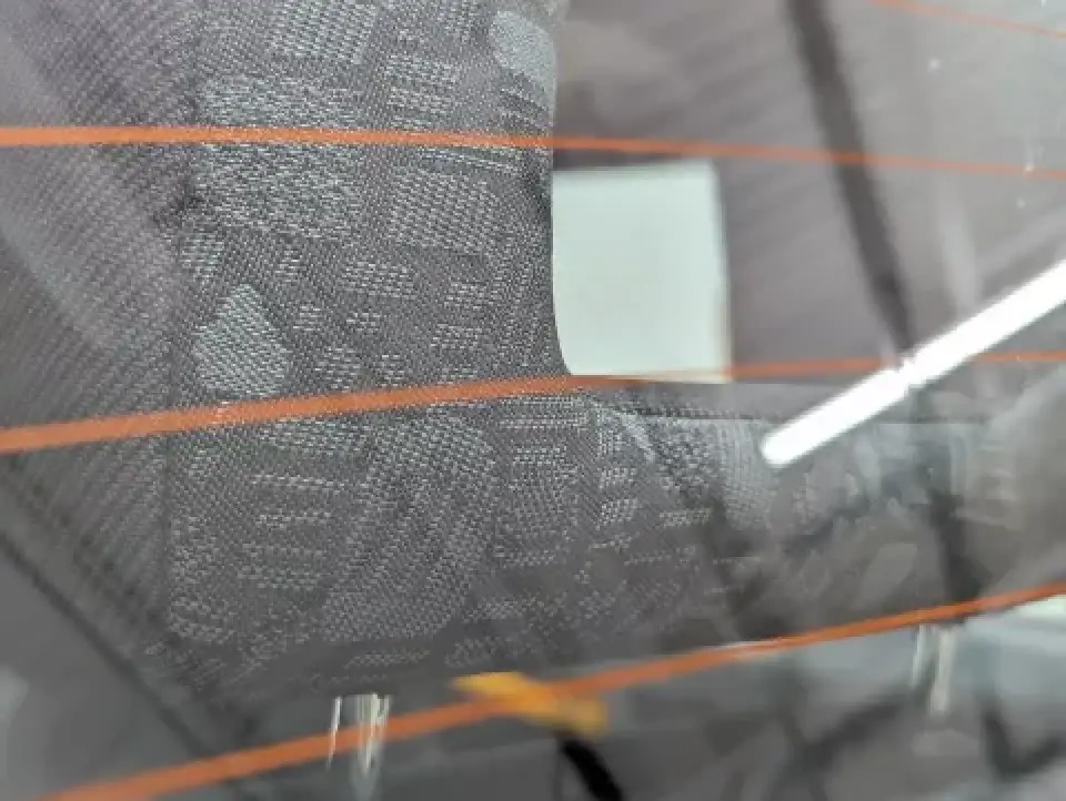 London taxi seat upholstery with orange stripe pattern