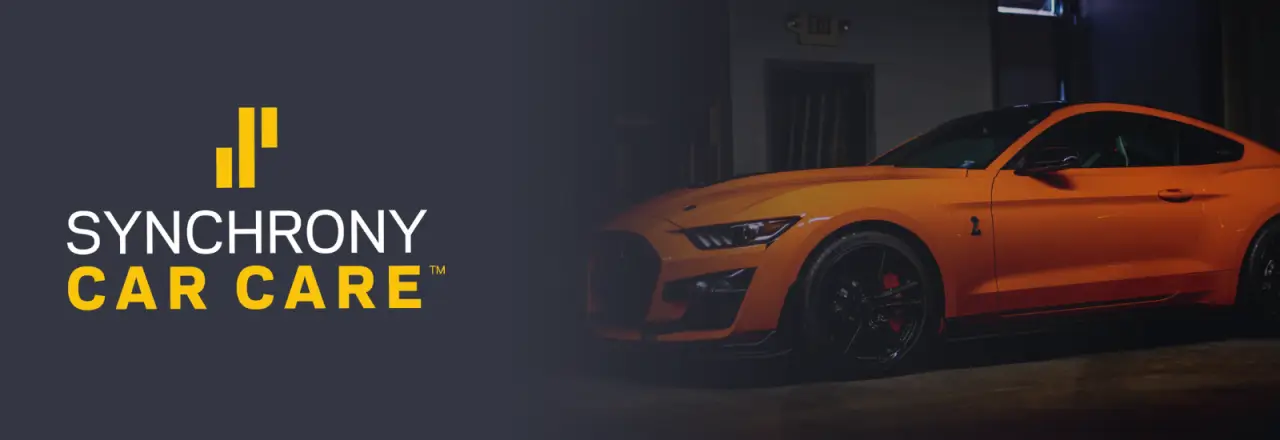 synchrony car care with an orange car