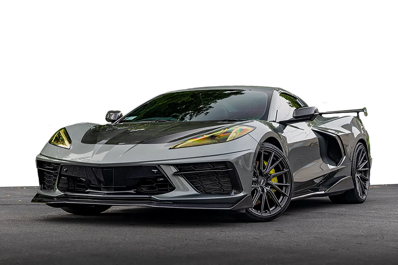 gray and black chevy corvette in parking lot