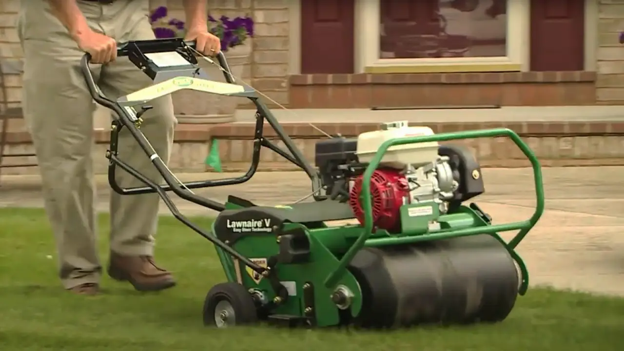 Person mowing a lawn
