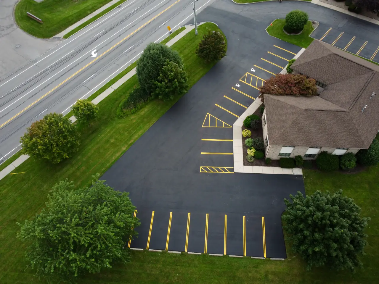 Aerial view of a paved parking lot.