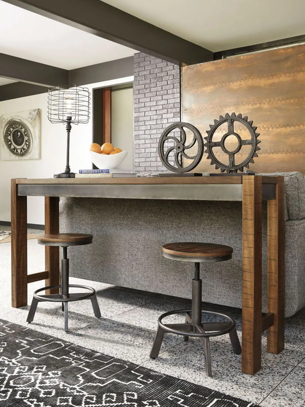 Torjin - 3 Pc. - Long Counter Table, 2 Stools - Dark Brown
