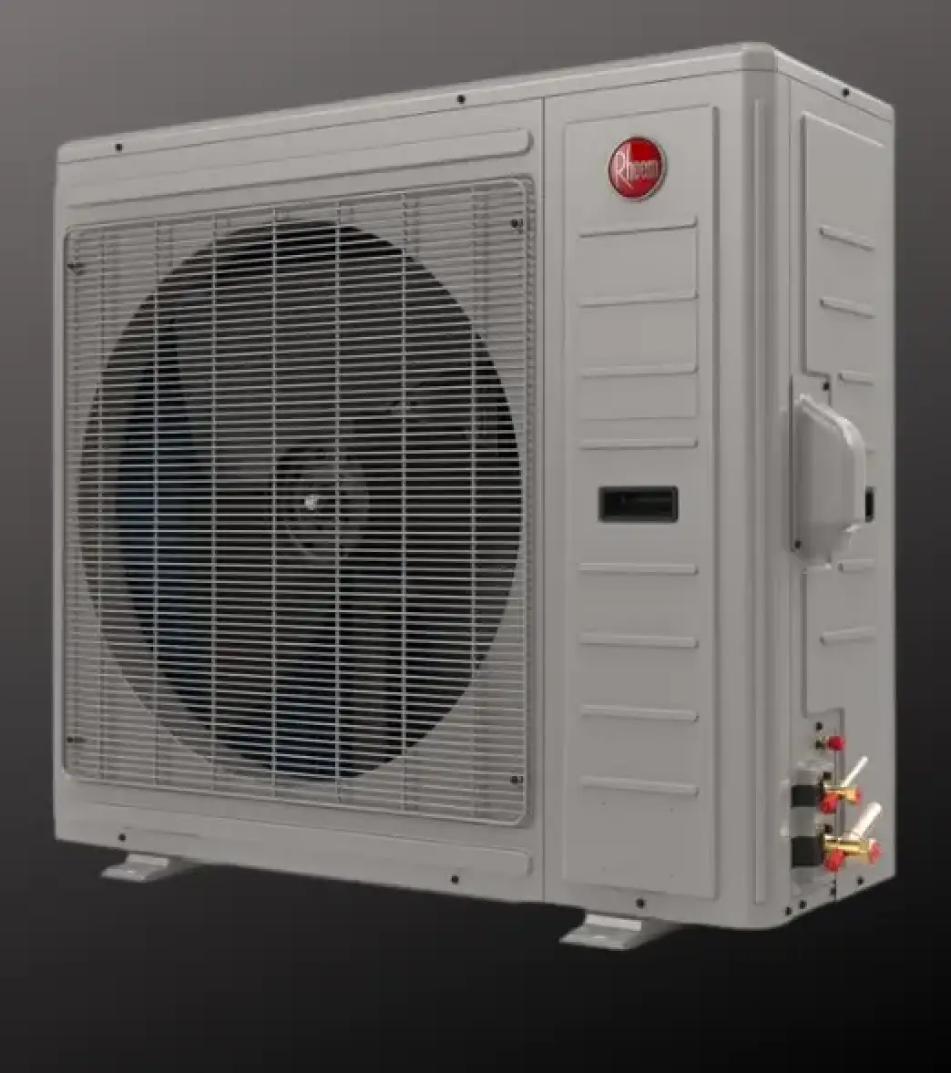 A gray Rheem outdoor HVAC unit with a large front fan, vents, and connection ports.