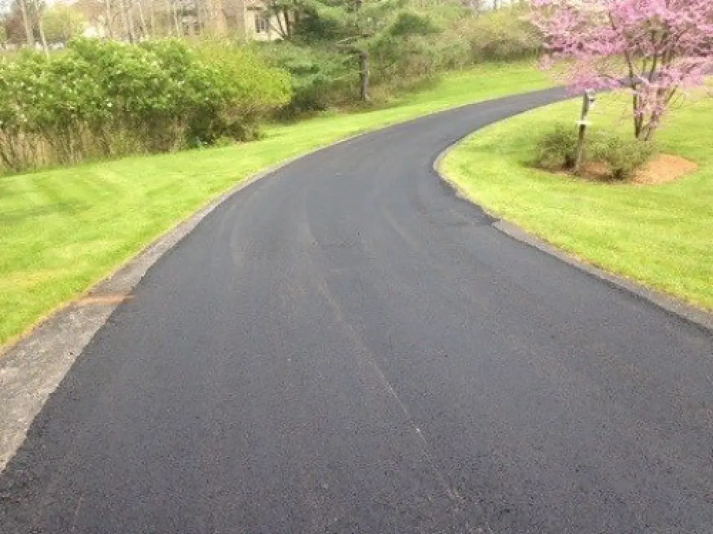freshly paved winding driveway