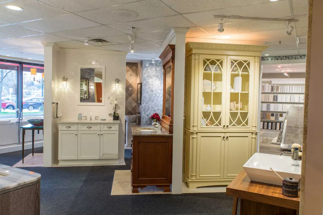Bathroom cabinets and sinks on display in a showroom.