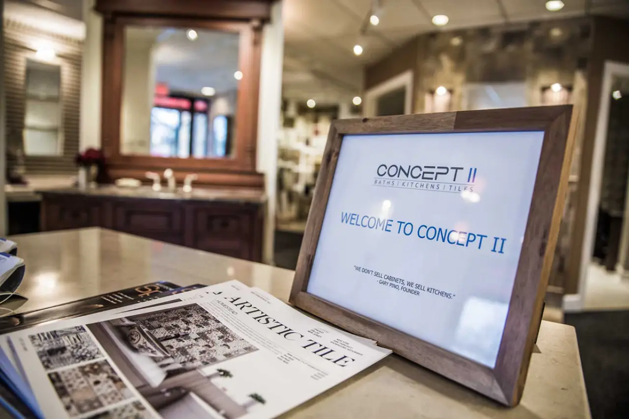 Welcome to Concept II plaque on display in the showroom.
