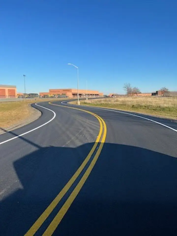 s curve road with freshly painted line striping