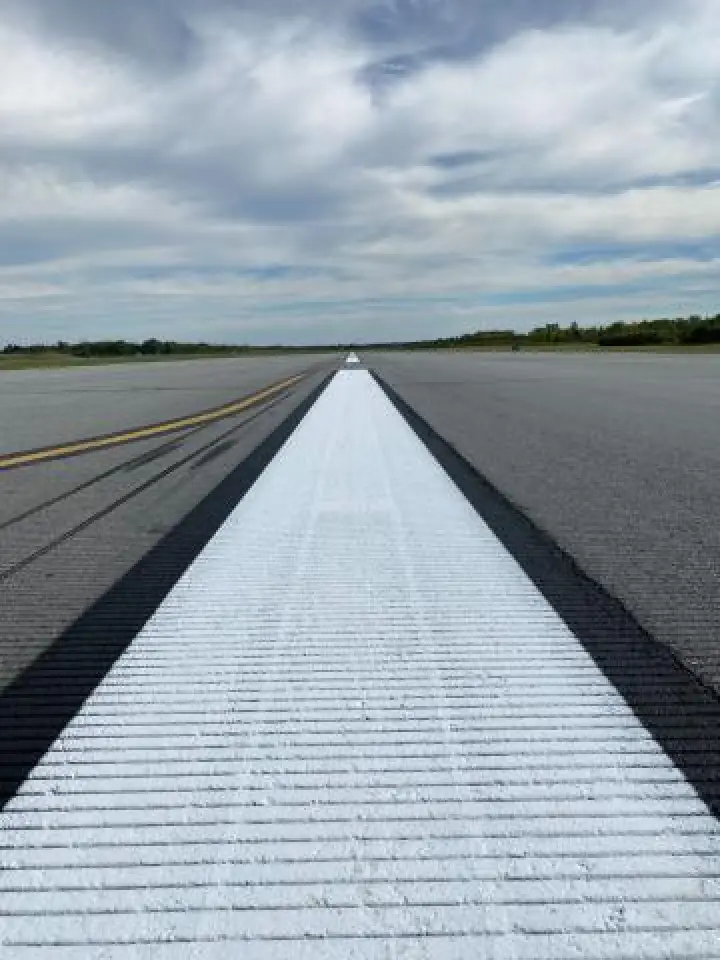 airport with white and yellow striping