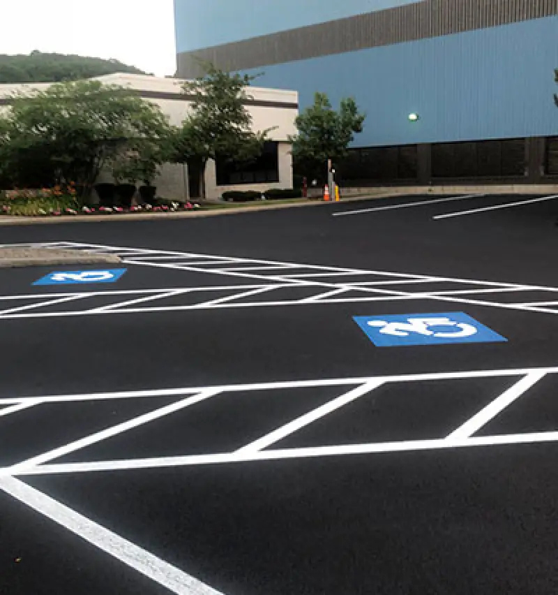 fresh painted white hanicapped parking spots