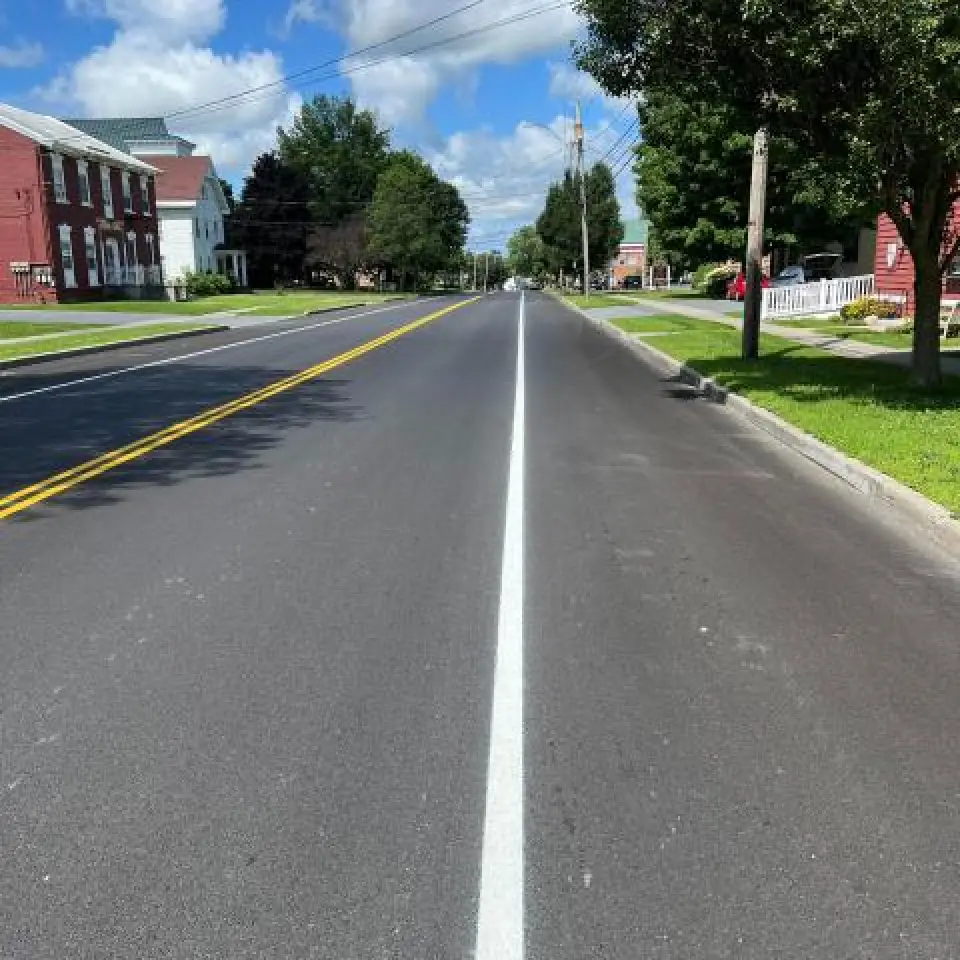 right side of freshly painted road with white line