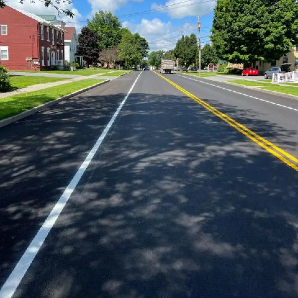 fresh road striping in small town road