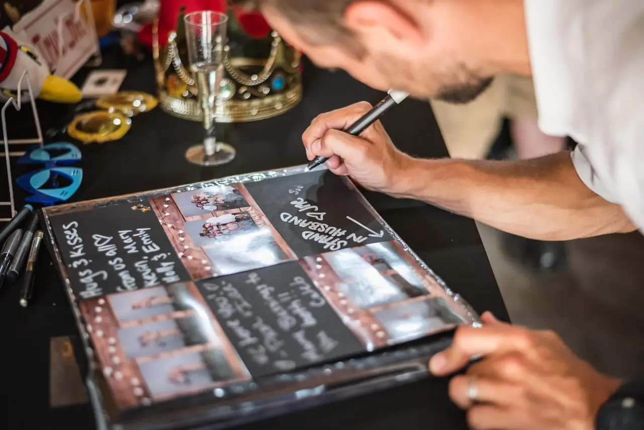 Memory Book with photo booth prints and handwritten guest notes