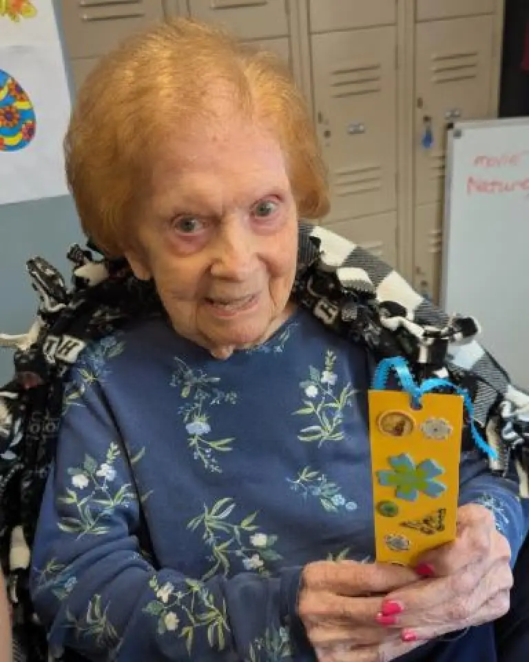 A resident shows the bookmark she created