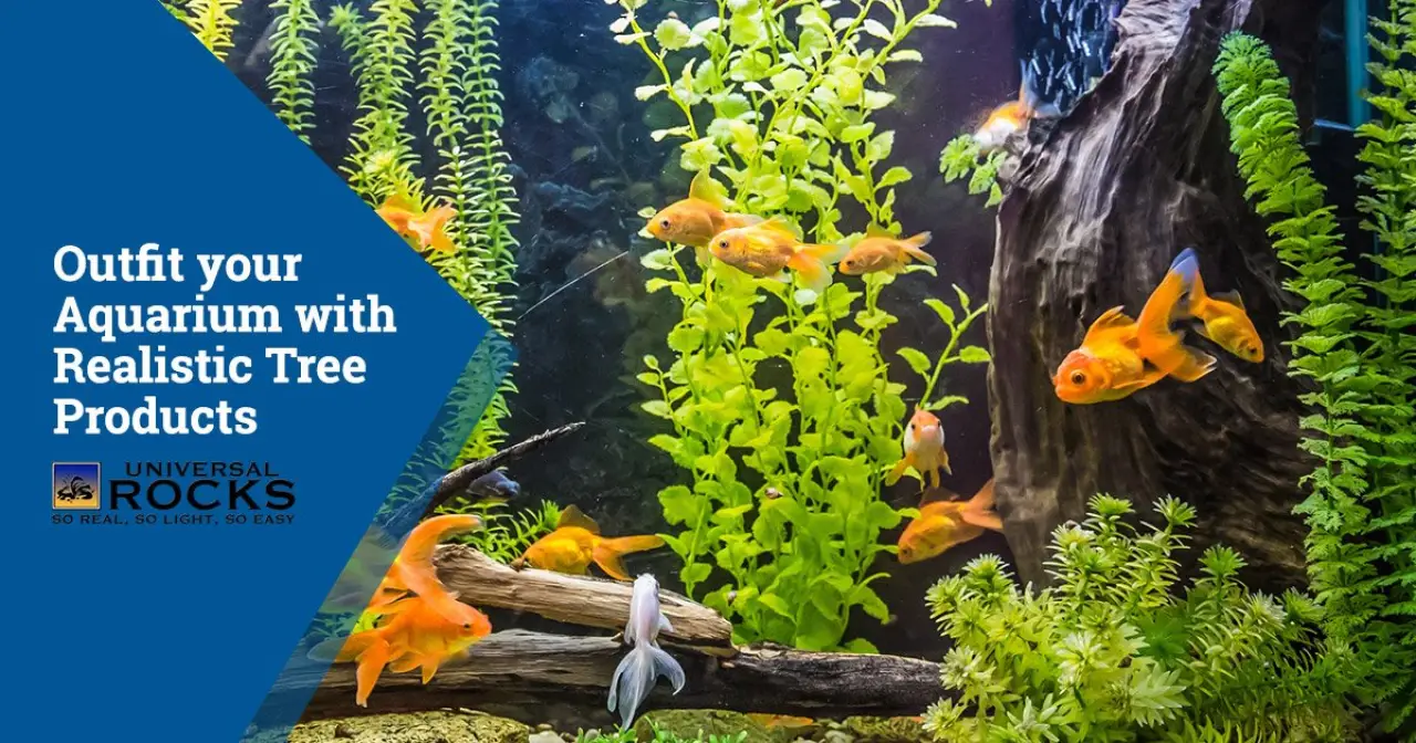 aquarium with goldfish swimming with faux green plants