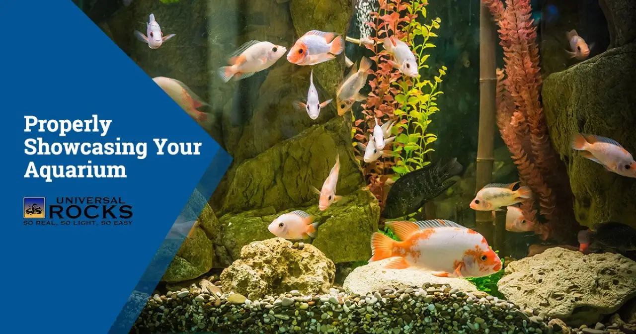 faux rocks in aquarium with white and orange fish