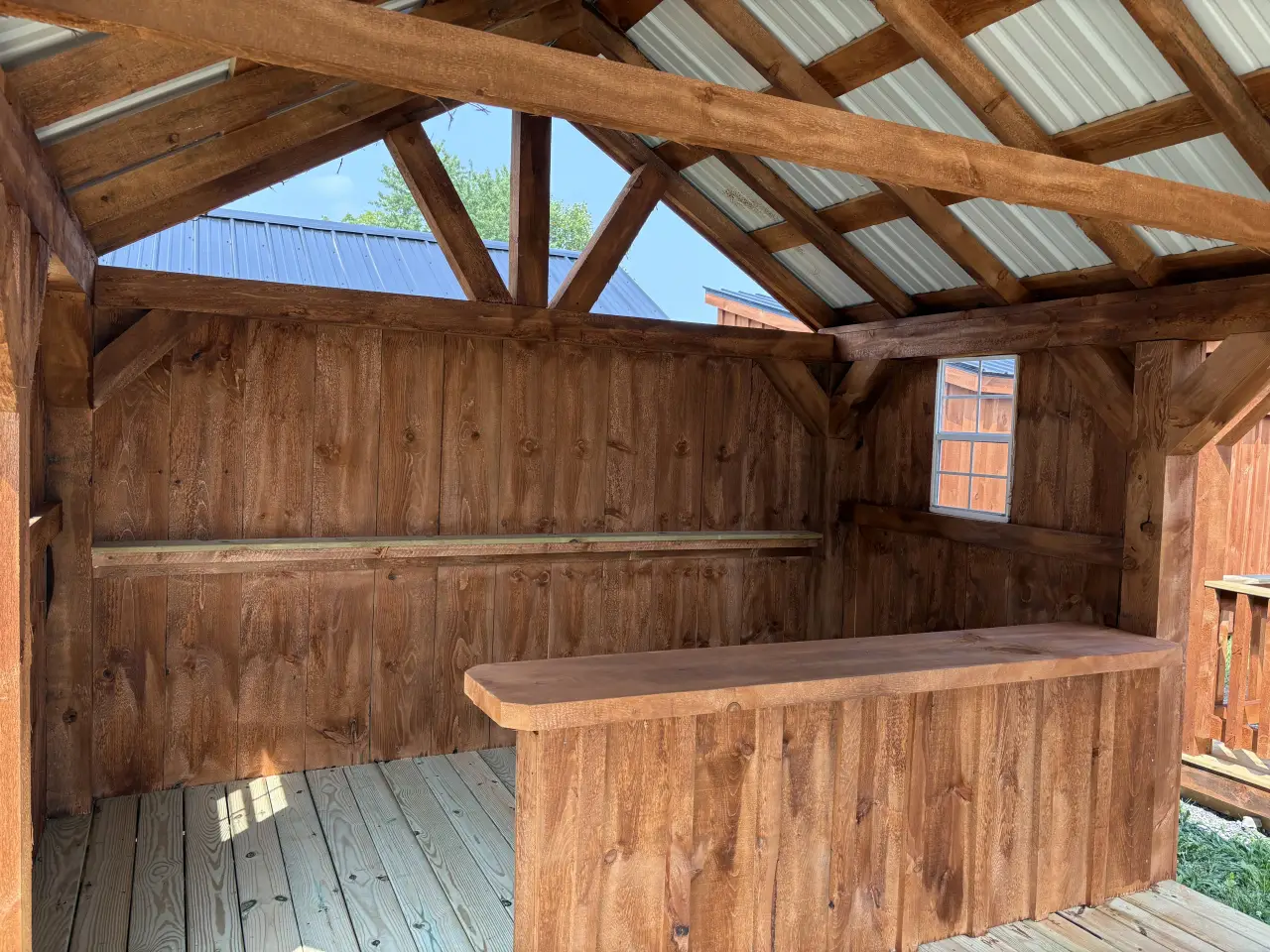 Rustic bar pavilion with covered seating and bar space