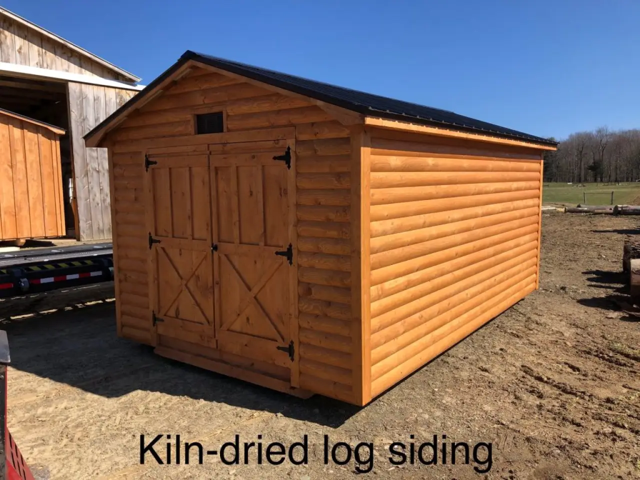 Kiln-dried log siding shed