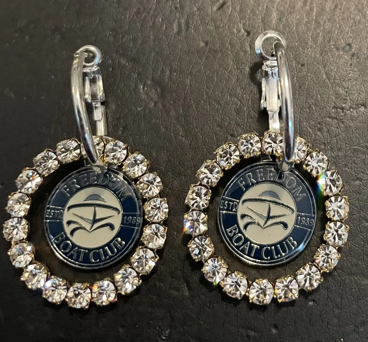 Freedom Boat Company Earring Set $79. (Priced per pair)