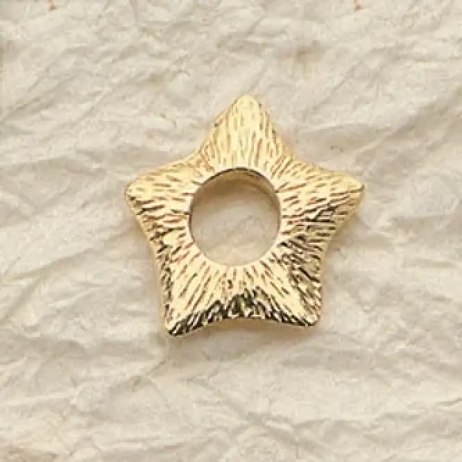 Serrated Star Charms. $26.  (Priced per pair)