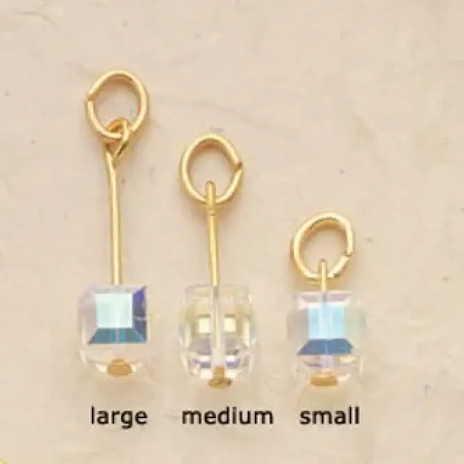 Aurora Borealis Cube Charms $28. (Priced per pair)