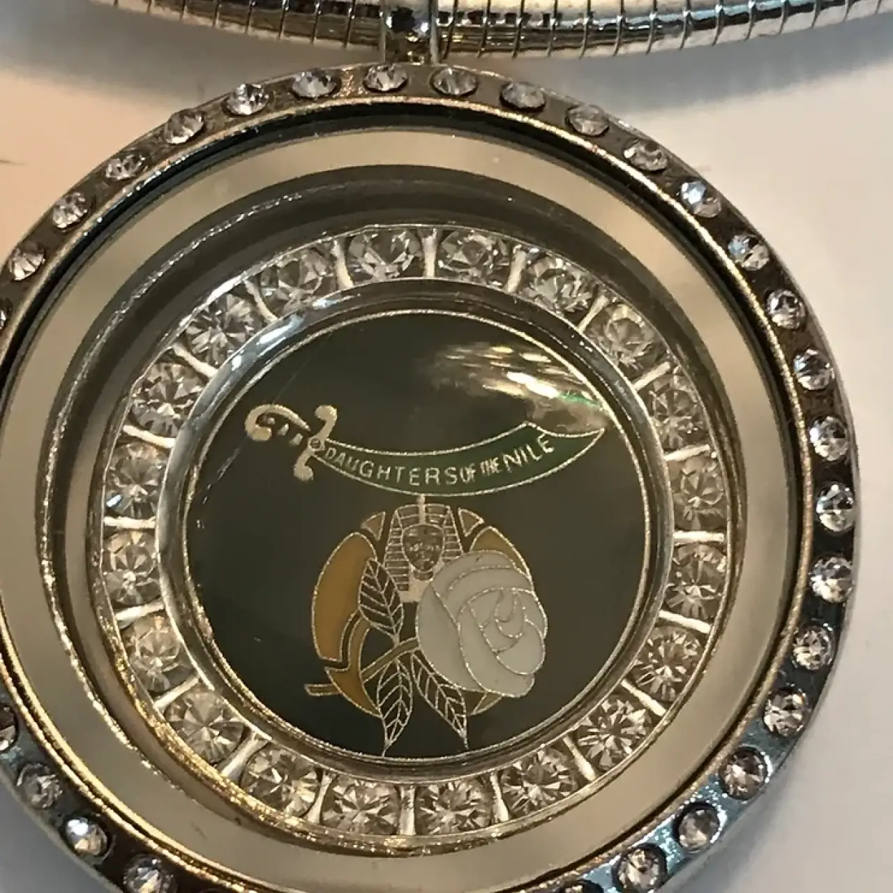 Daughters of the Nile Crystal Locket ( The locket opens and has a glass window)