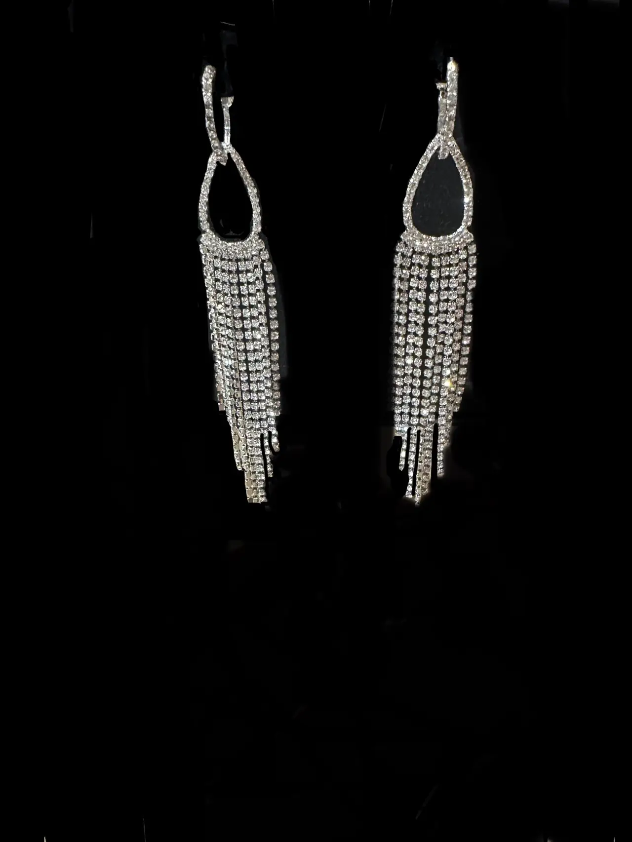 Flowing crystal earring set. $72 pair