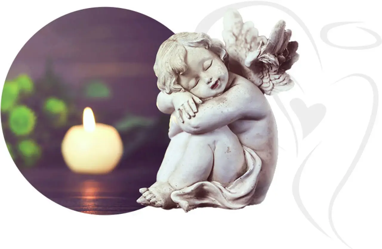 serene angel statue with folded arms next to a lit candle and green leaves