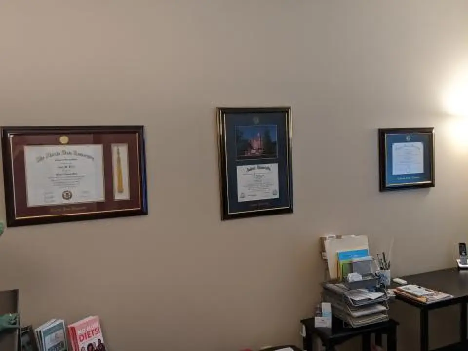 framed awards on a wall