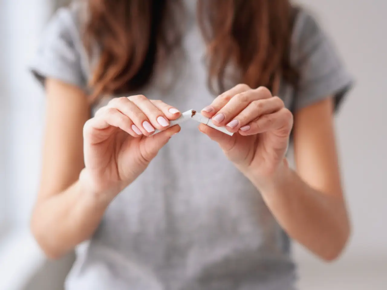 breaking a cigarette