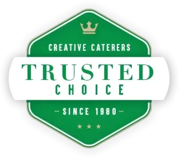 A green badge logo featuring Creative Caterers, Trusted Choice, and Since 1980, with a crown and stars.