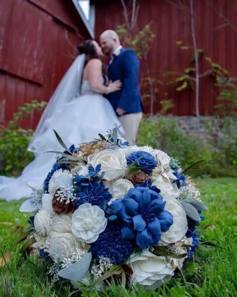 bride and groom with flower bouquet