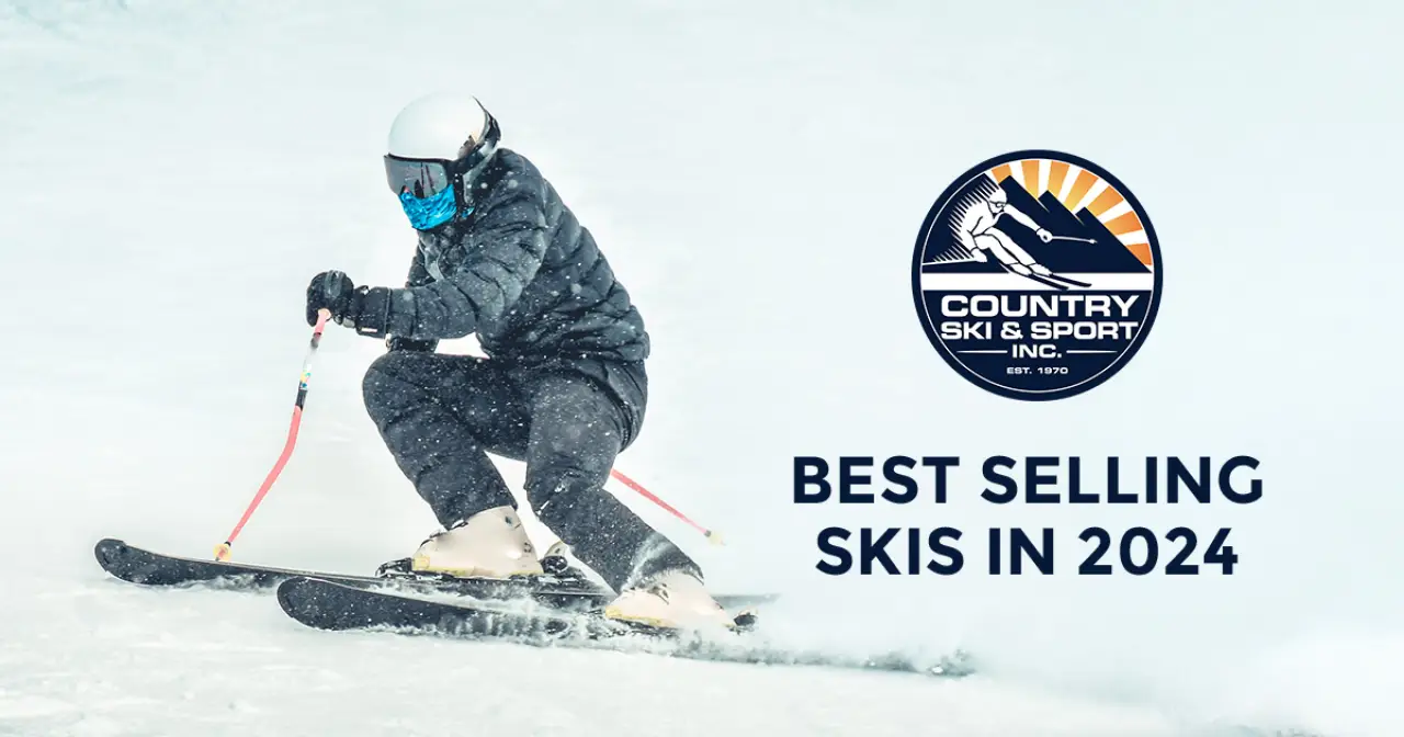 man in white ski helmet and black jacket and pants skiis down a slope "best selling skis in 2024"