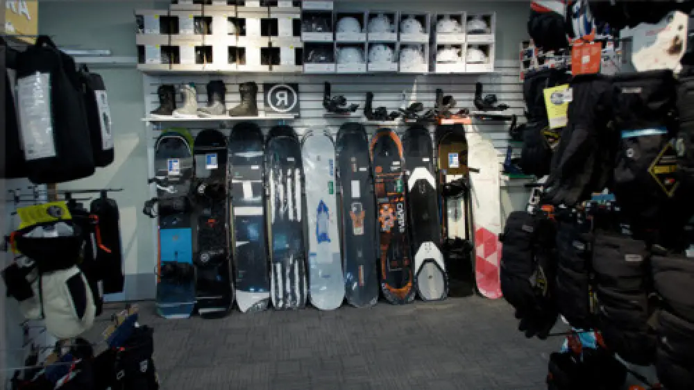 snowboards learning up against a wall at Country Ski in Westwood