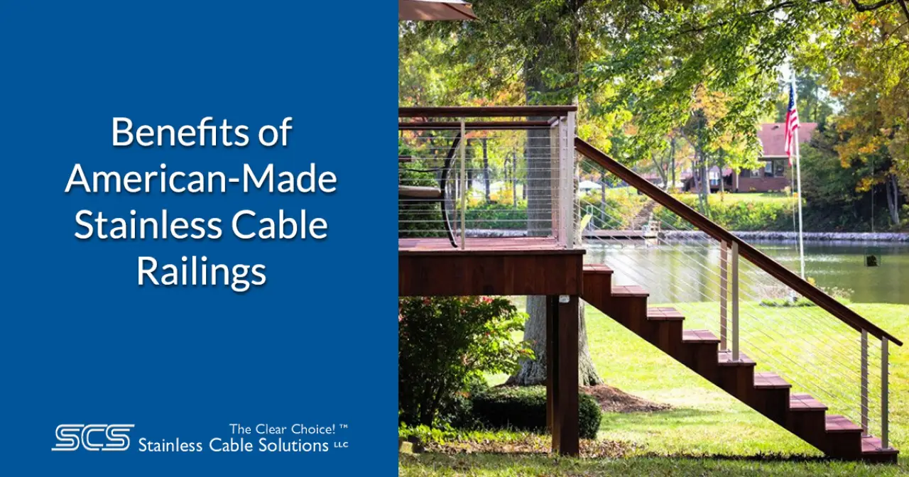 American-made stainless cable railing on a wooden staircase beside a pond.
