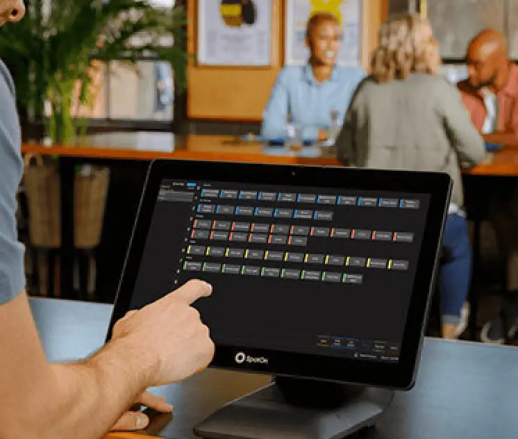 person pointing using touch screen pos system