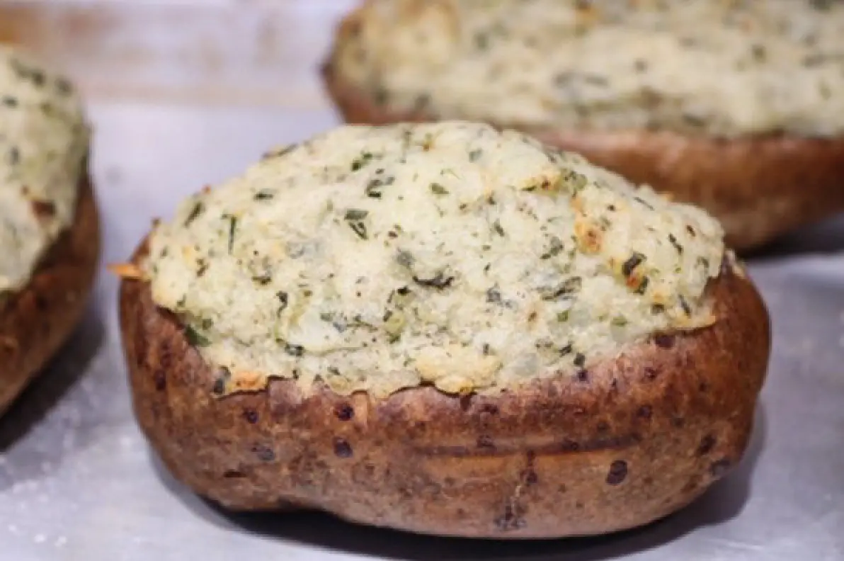 Twice-baked potatoes filled with herbed sour cream and chives.