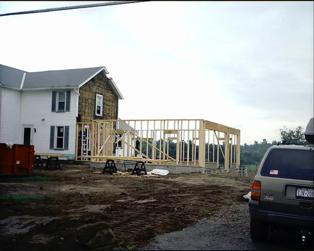 white house with an in progress addition