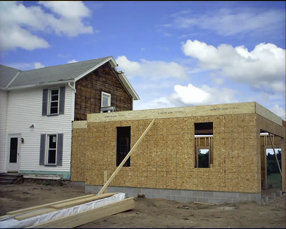 first floor of two story home addition being framed