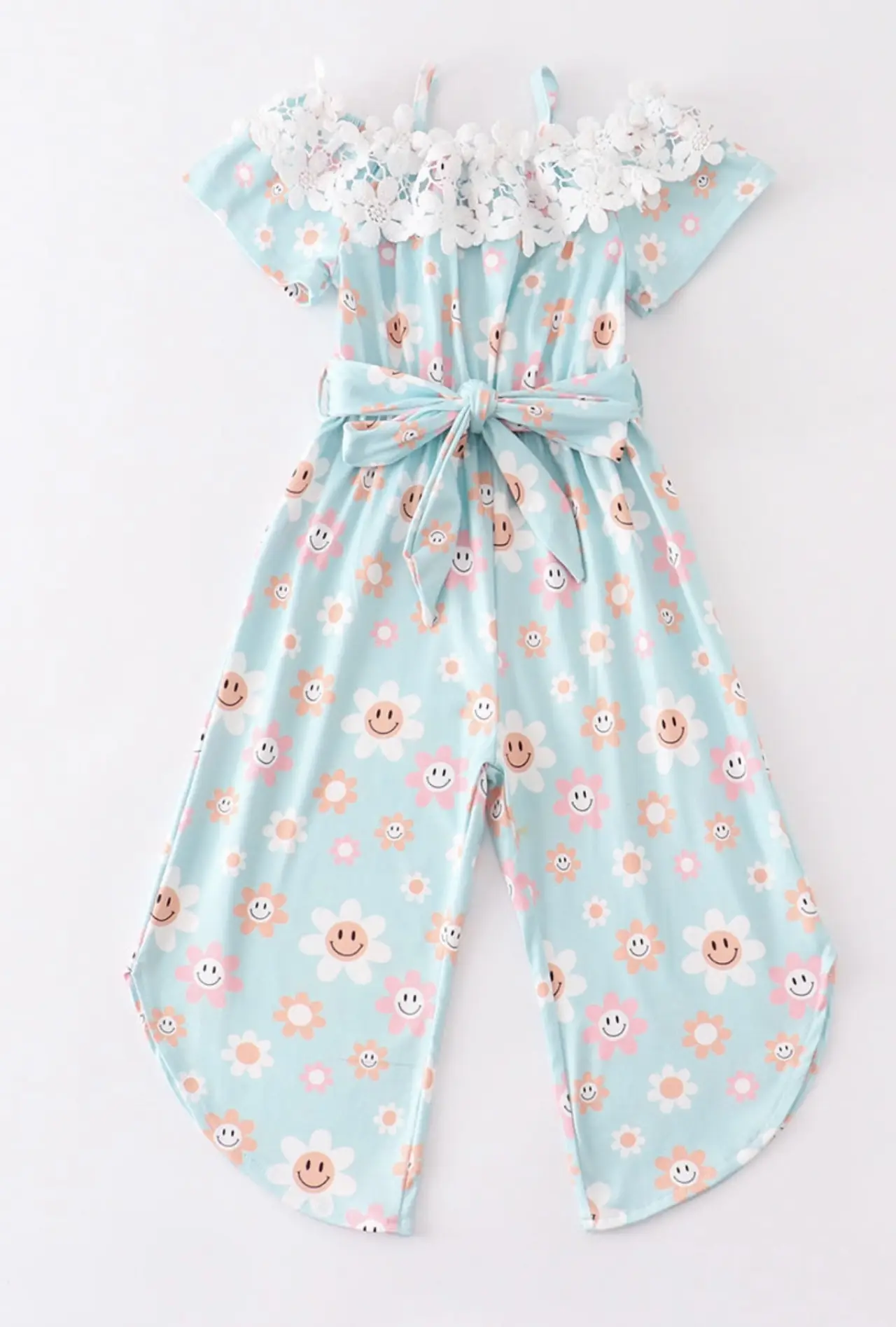 light turquoise capri romper with face flowers