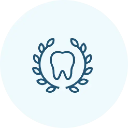 Outline of a tooth surrounded by a laurel wreath on a light blue circular background.