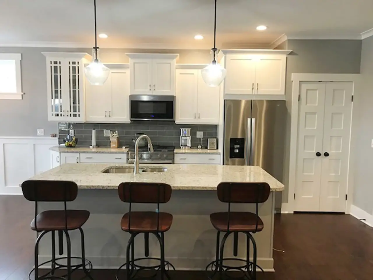 Beautiful kitchen island of custom built home by Sortino Properties in Livonia NY.