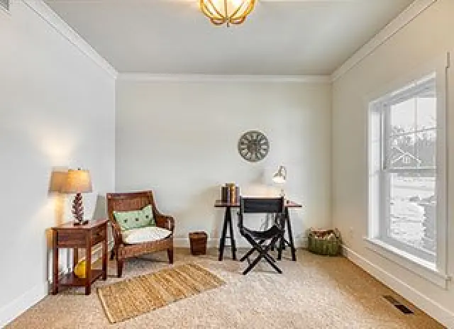 off white office area with bright light and accents
