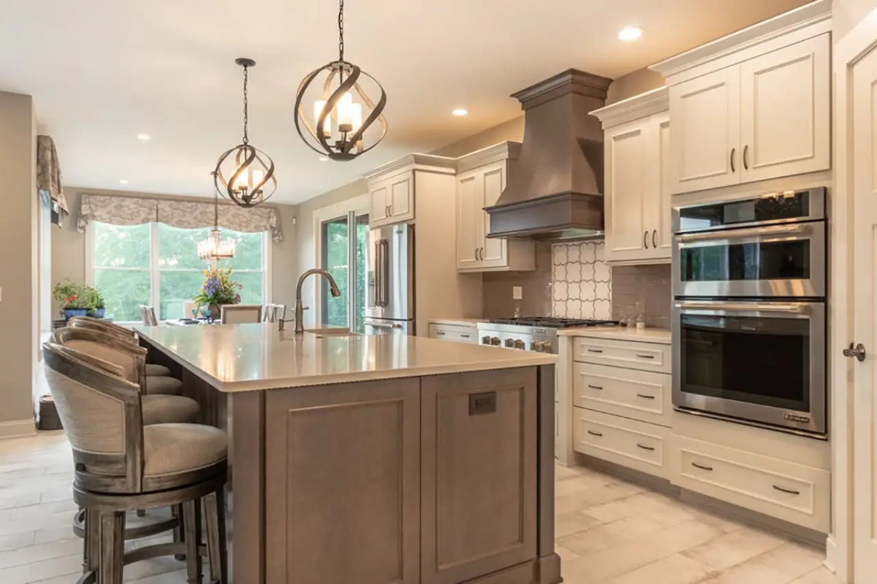 Kitchen with large island in a stunning custom built home by Sortino Properties in Rochester NY.