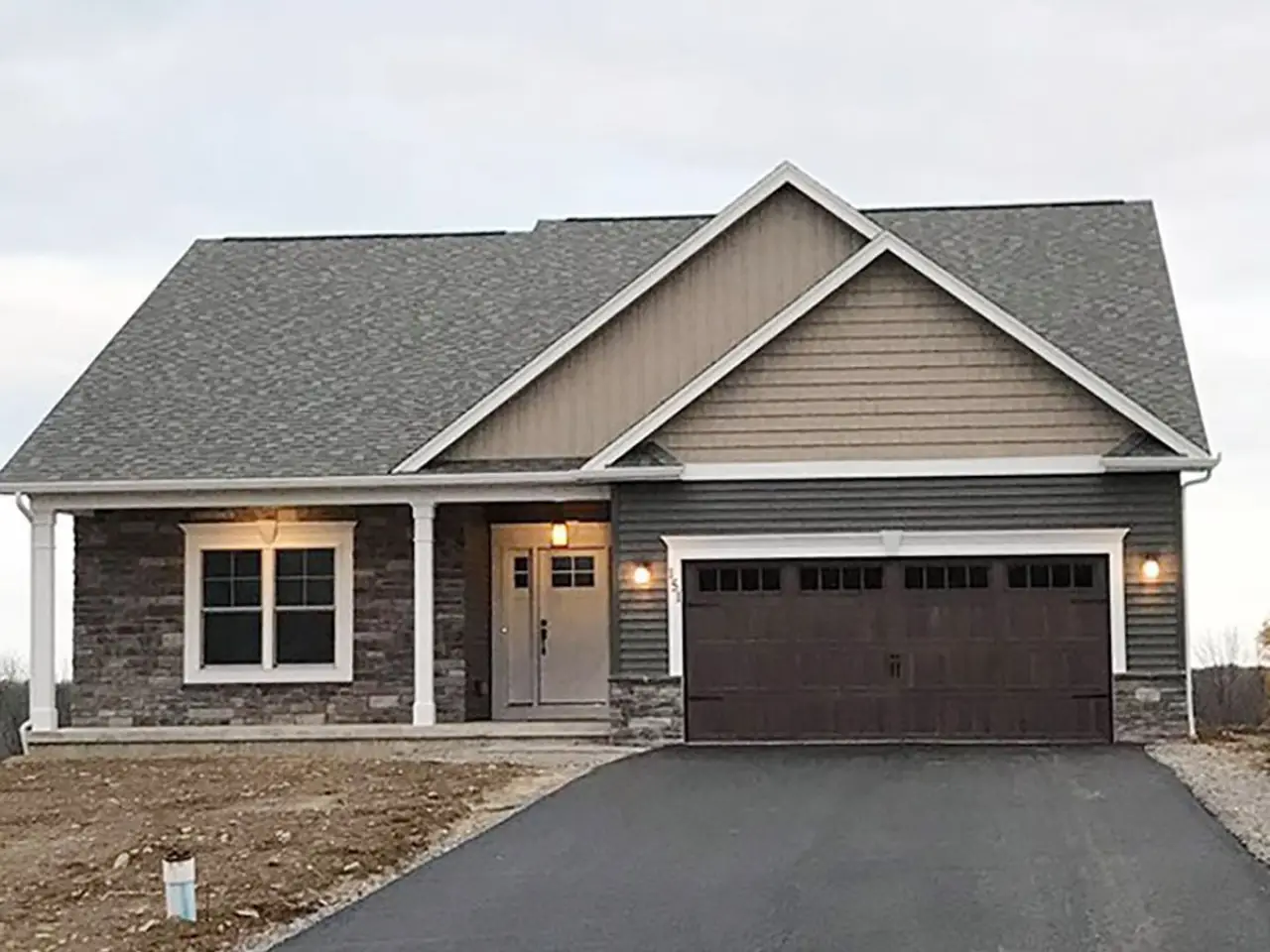 Front of custom built home by Sortino Properties in Livonia NY.