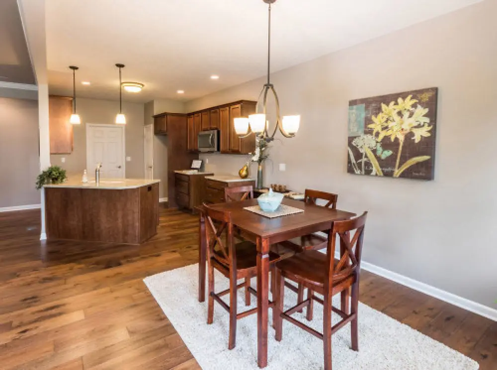 Dining area in a Villas at Churchville ranch home by Sortino Properties.