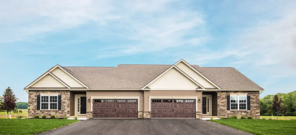 Exterior of a new Monarch Manor townhome in Farmington NY by Sortino Properties.