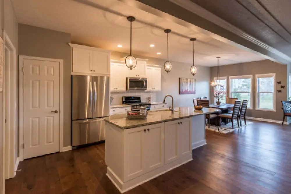 Open kitchen area in a new Monarch Manor townhome by Sortino Properties in Farmington NY.