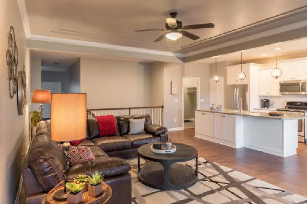 Open living and kitchen area in a new Monarch Manor townhome in Farmington NY by Sortino Properties.